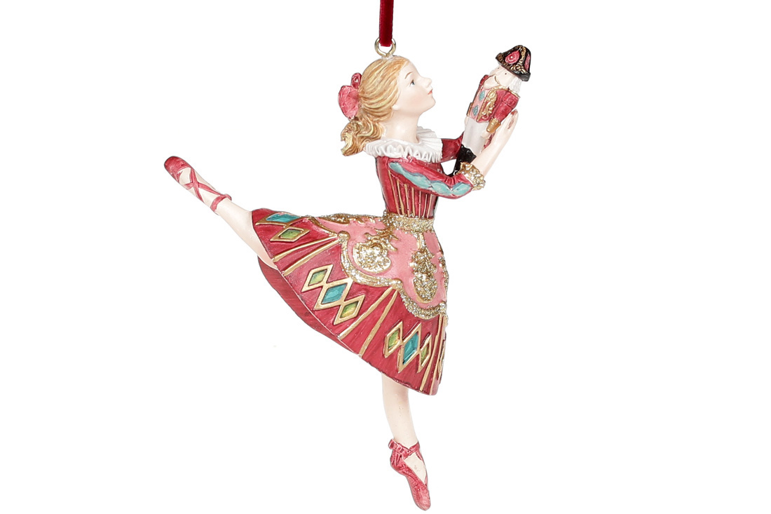 Ballerina Clara with a nutcracker in the Baroque style